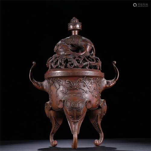 A Chinese Bronze Elephant Topped Incense Burner