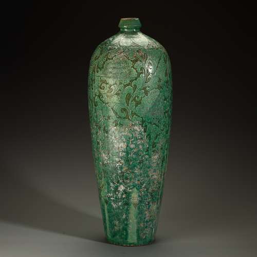 Carved plum bottle in ancient Cizhou kiln