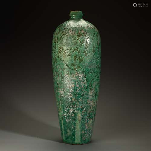 Carved plum bottle in ancient Cizhou kiln