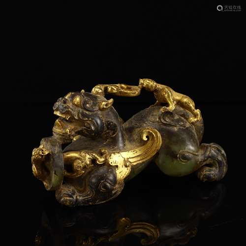 Ancient jade gilded lion