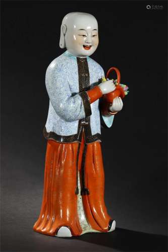 A Chinese Famille Rose Porcelain Boy Statue
