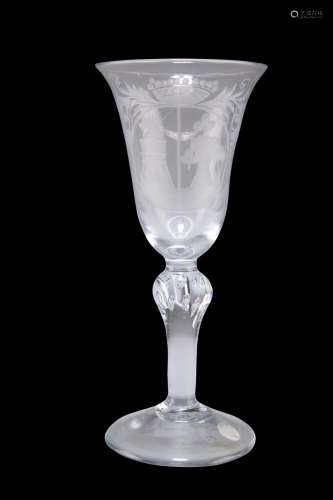 AN ENGRAVED WINE GLASS, CIRCA 1765, the trumpet bowl engrave...