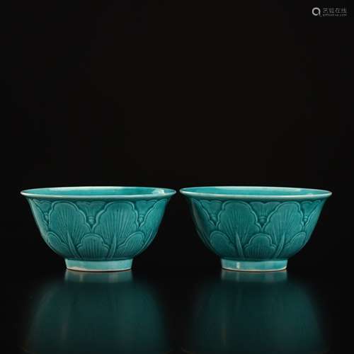 A pair of turquoise glazed banana cups