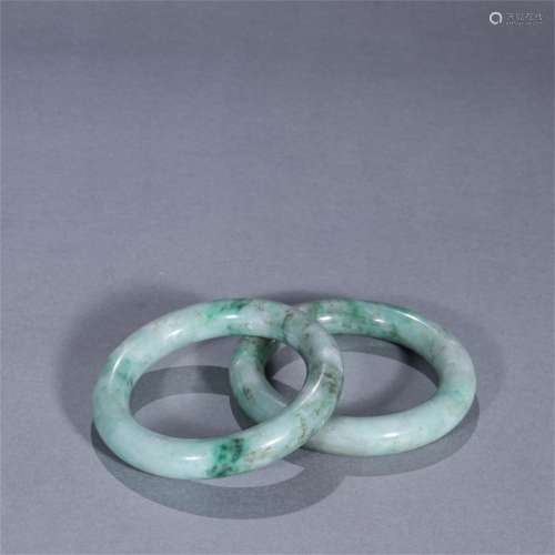Pair of Chinese Carved Jadeite Bracelets