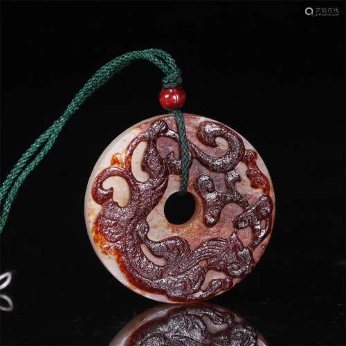 A Chinese Carved Jade Bi Decoration