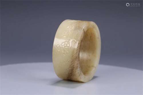 A Chinese Carved Jade Decoration with Flower