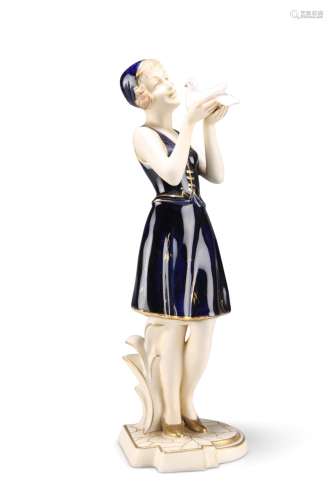 A ROYAL DUX FIGURE, in the Art Deco taste, modelled as a gir...