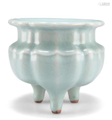 A CHINESE CELADON TRIPOD CENSER, of ribbed shouldered circul...