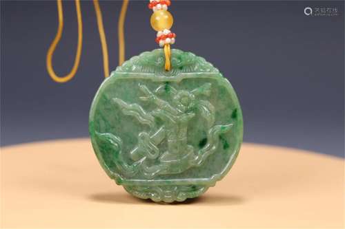 A Chinese Carved Jadeite Peach Shaped Pendant