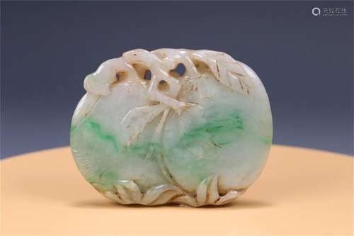 A Chinese Carved Jadeite Peach Shaped Decoration