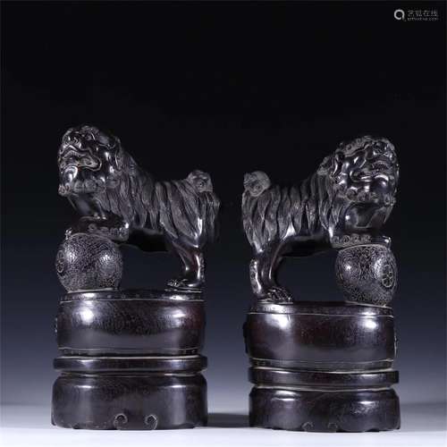 Pair of Chinese Zitan Wood Decorations with Beast