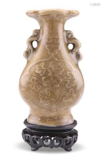 A SUNG TWO-HANDLED VASE, of flask form with ruyi handles, mo...