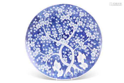 A 19TH CENTURY CHINESE BLUE AND WHITE CHARGER, circular, pai...