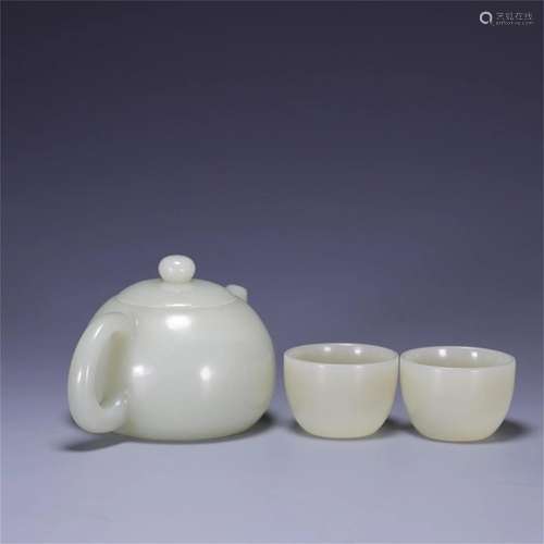 A Chinese Carved Jade Teapot and Cup