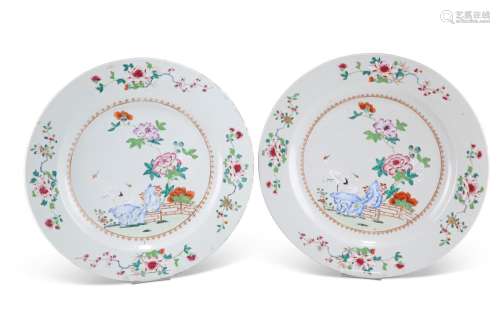 A PAIR OF 18TH CENTURY CHINESE FAMILLE ROSE CHARGERS, each e...