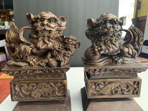 Pair of Chinese carved foo dogs.