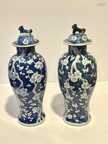 Pair of Chinese blue and white porcelain vases with lids.