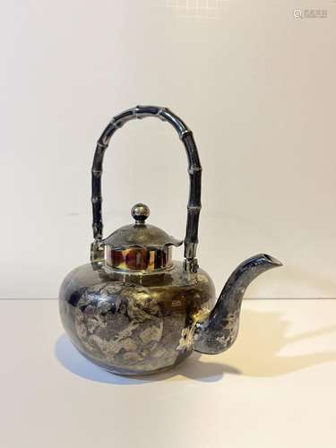 Chinese silver teapot.