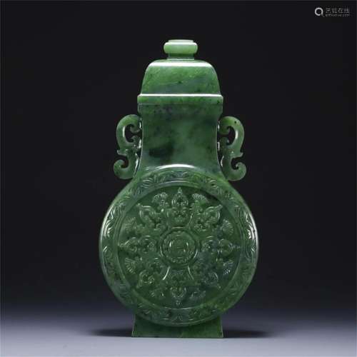 A Chinese Carved Jadeite Vase with Lid