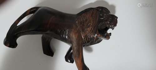 Wood lion sculpture Apx 8 x 5”