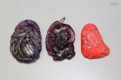 Three Chinese stone and red coral pendants.