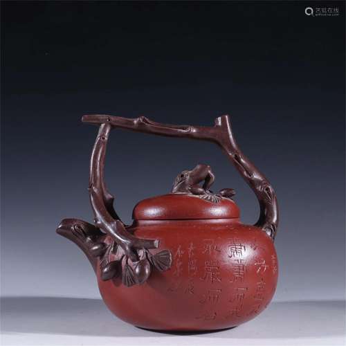 A Chinese Yixing Zisha Teapot with Calligraphy