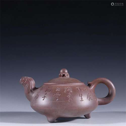 A Chinese Yixing Zisha Teapot with Calligraphy