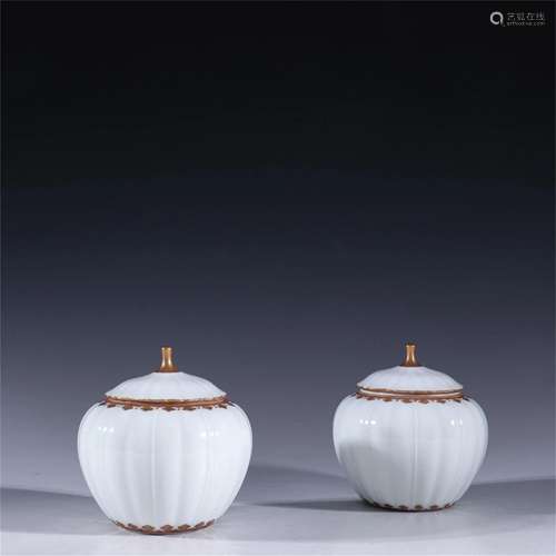 Pair of Chinese White Glazed Lidded Jar