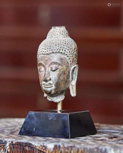 91 - A BRONZE HEAD OF BUDDHA