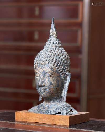 93 - A BRONZE HEAD OF BUDDHA