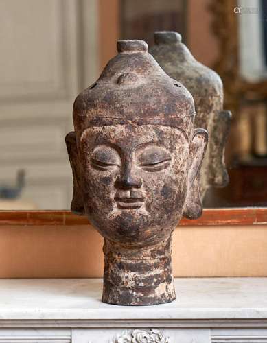 99 - A CAST-IRON HEAD OF A BODHISATTVA