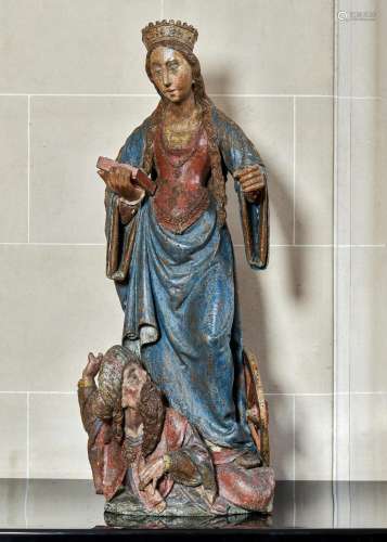 173 - A POLYCHROME AND CARVED WOOD FIGURE OF SAINT CATHERINE...