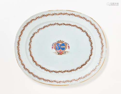 220 - A POLYCHROM DECORATED OVAL PORCELAIN ARMORIAL DISH