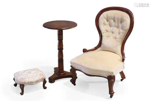 A VICTORIAN MAHOGANY NURSING CHAIR, with spoon back and scro...