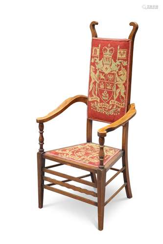 AN ARTS AND CRAFTS MAHOGANY AND UPHOLSTERED ARMCHAIR, ATTRIB...