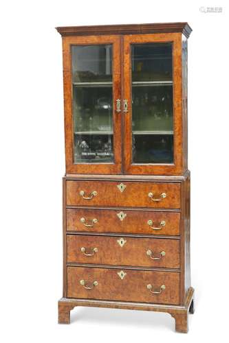 AN EARLY 18TH CENTURY WALNUT CABINET ON CHEST, the upper sec...