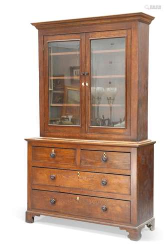 A 19TH CENTURY OAK BOOKCASE CABINET, the upper section with ...