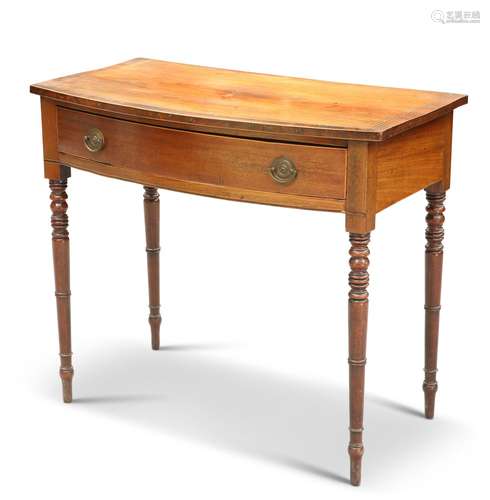 AN EARLY 19TH CENTURY MAHOGANY BOW-FRONT SIDE TABLE, the cro...