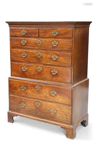 A GEORGE III MAHOGANY CHEST ON CHEST, the upper section with...