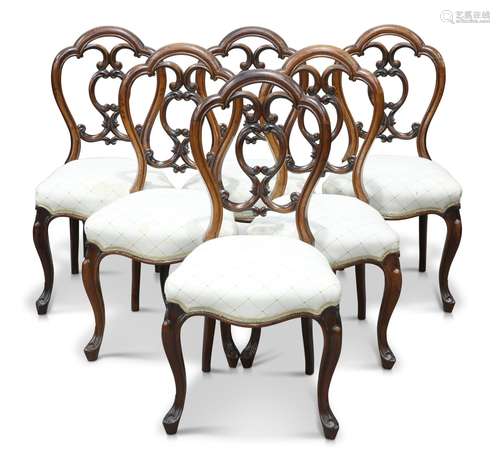 A SET OF SIX VICTORIAN ROSEWOOD PARLOUR CHAIRS, each with do...