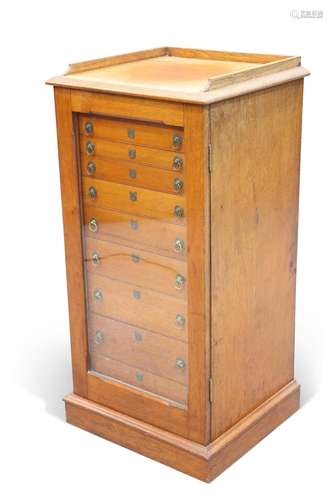 A LATE VICTORIAN MAHOGANY COLLECTOR'S CABINET, with gal...