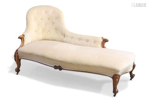 A VICTORIAN WALNUT CHAISE LONGUE, with button back and scrol...