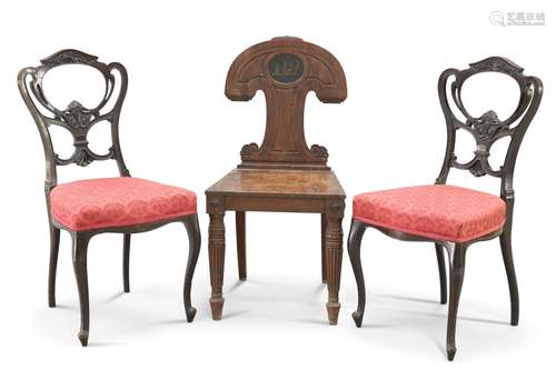 A REGENCY MAHOGANY HALL CHAIR, the unusually shaped back wit...