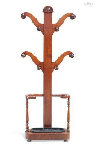 A VICTORIAN MAHOGANY HALL STAND, of tree-form with eight tur...