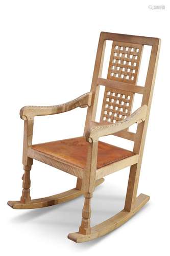 ROBERT THOMPSON OF KILBURN, A MOUSEMAN OAK ROCKING CHAIR, wi...