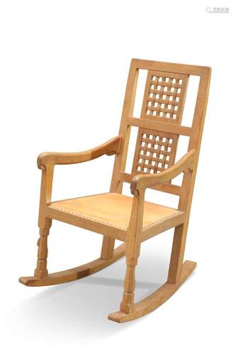 ROBERT THOMPSON OF KILBURN, A MOUSEMAN OAK ROCKING CHAIR, wi...