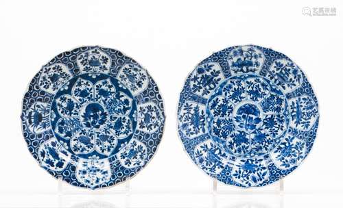 A pair of scalloped plates