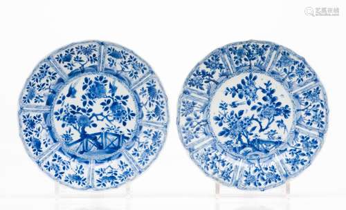 A pair of scalloped plates