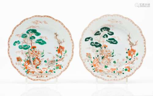 A pair of scalloped plates