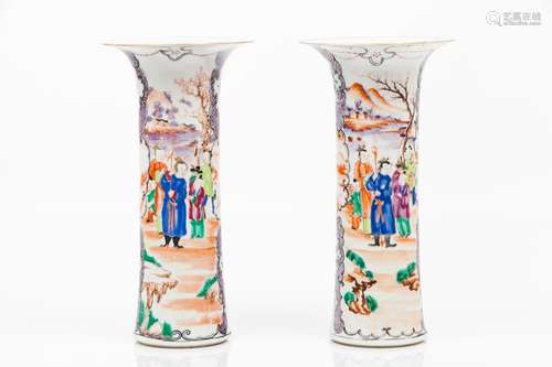 A pair of cylindrical vases